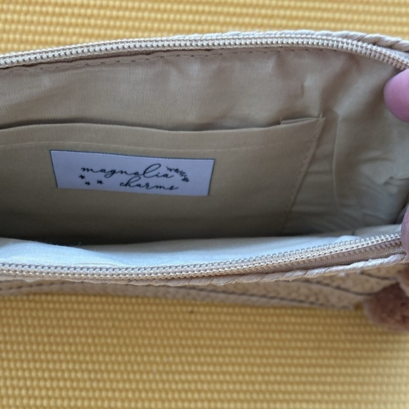 Beach Days Pom Pom Oversized Straw Clutch, Natural zipper closure 
10” x 7” - Picture 3 of 6